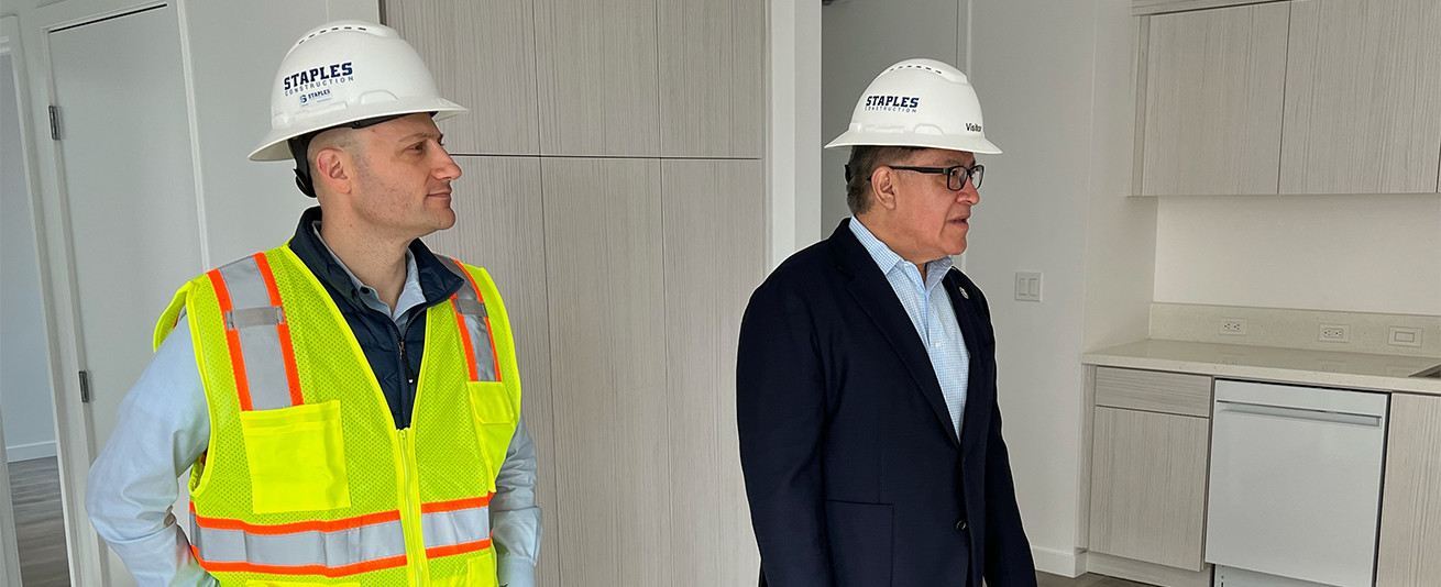 Picture of Jeremy Empol of FHLBank San Francisco with U.S. Congressman Carbajal, who visited a new affordable housing development for veterans in Ventura, Calif.