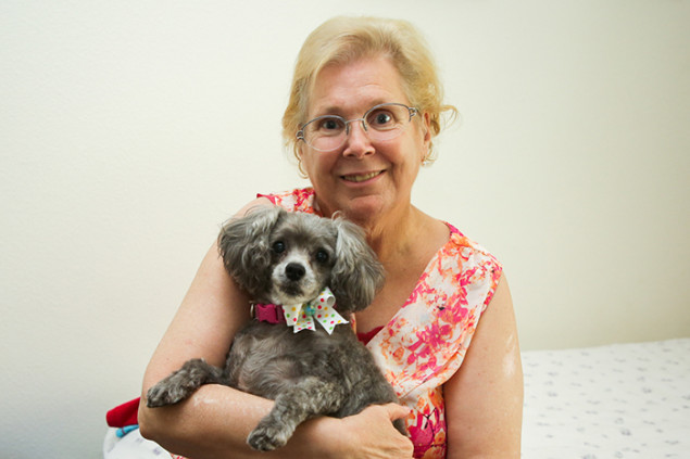Catherine Williams and her freshly groomed dog, Baby Girl.