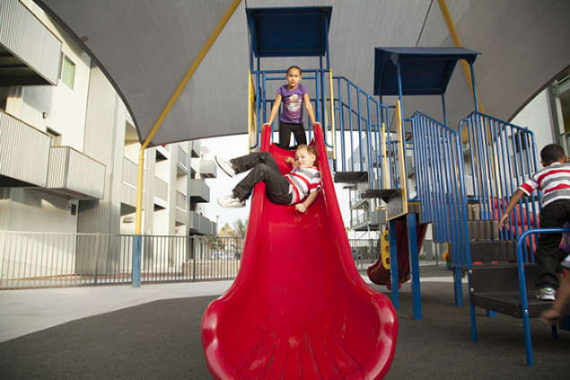 A colorful playground is a safe place for the children, and features a splash pad for when it's time to cool off.