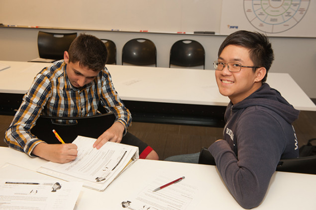 Abdul Tawil and Richard Lui, both 16, in class on a Saturday.