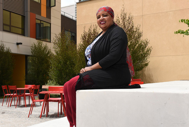 Hiba Elhag in the courtyard at the brand new 626 Mission Bay Boulevard family apartments complex.