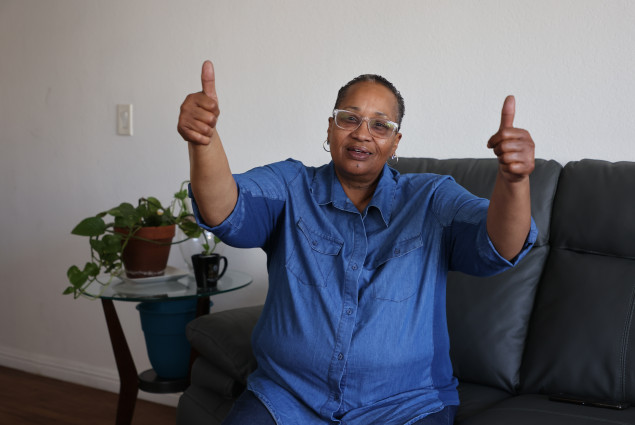 Photo of Doris Ealy showing two thumbs up.